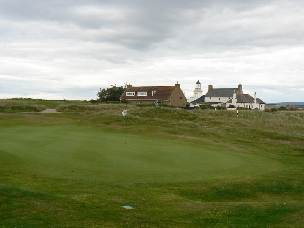 The lighthouse marks the end of the outward stretch of holes