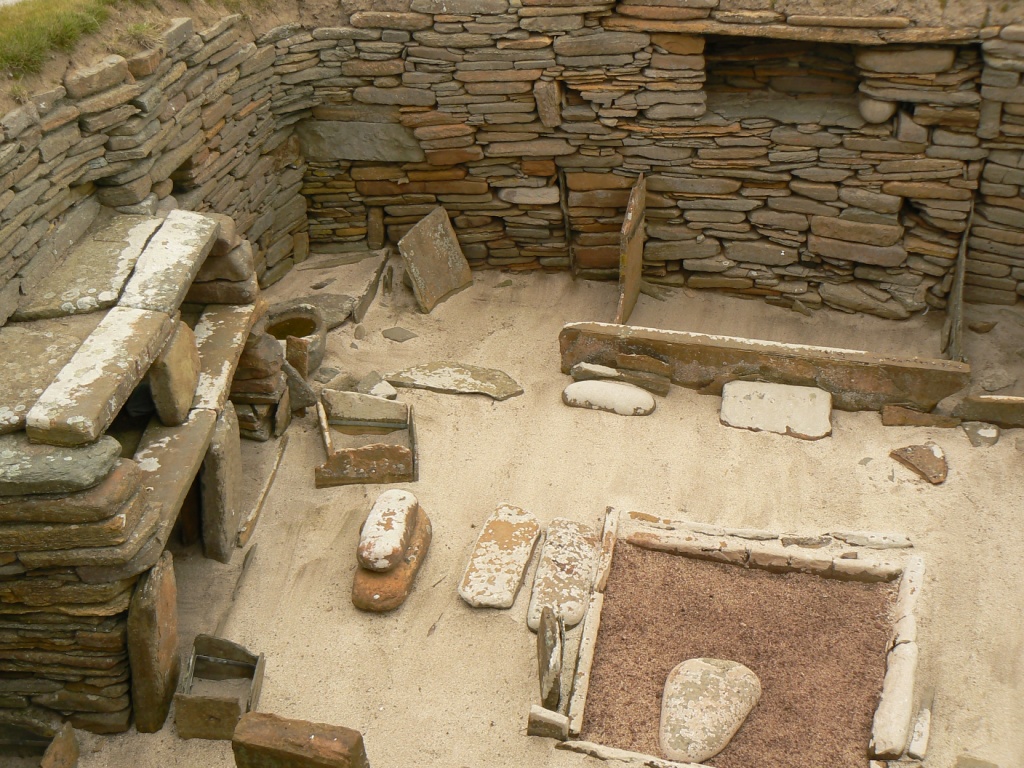 spot the square stone pool/fridge between the dresser and fire pit