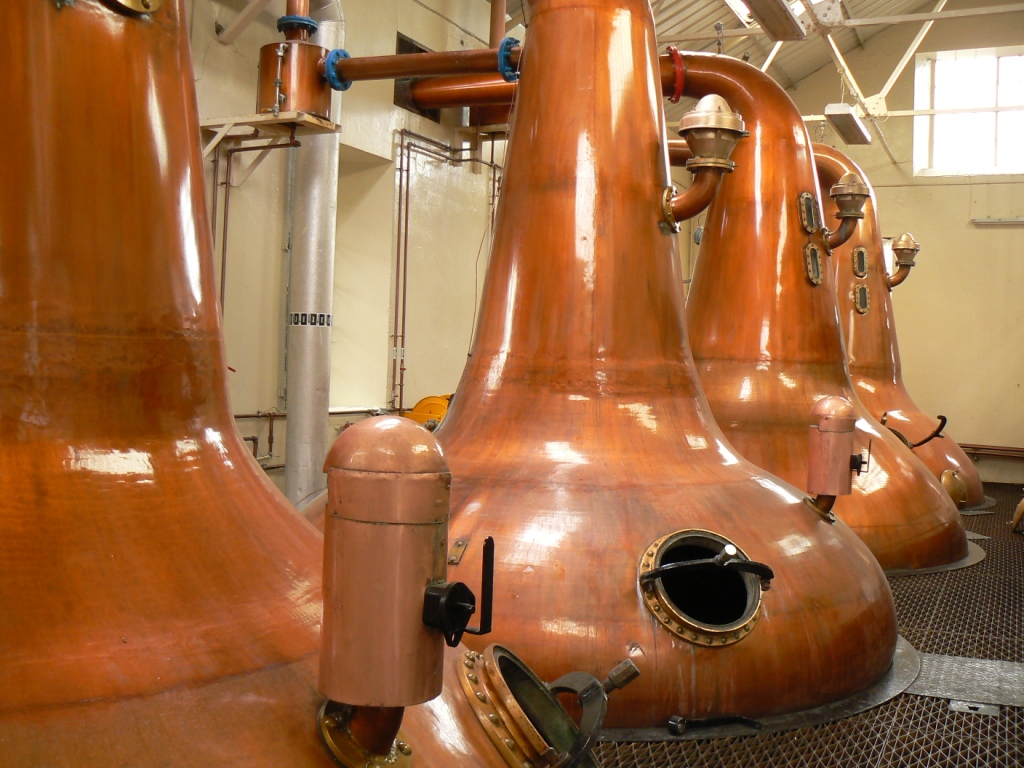 The huge stills have a different shape at each distillery and that helps to give each a different flavor.