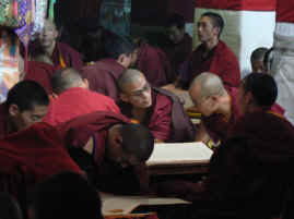 Drepung monks closeup.JPG (207102 bytes)